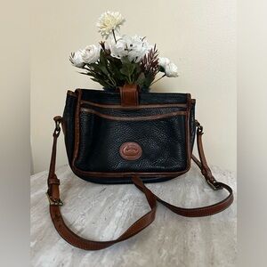 Dooney and Bourke Black Pebbled Vintage Bag with Flap Lock